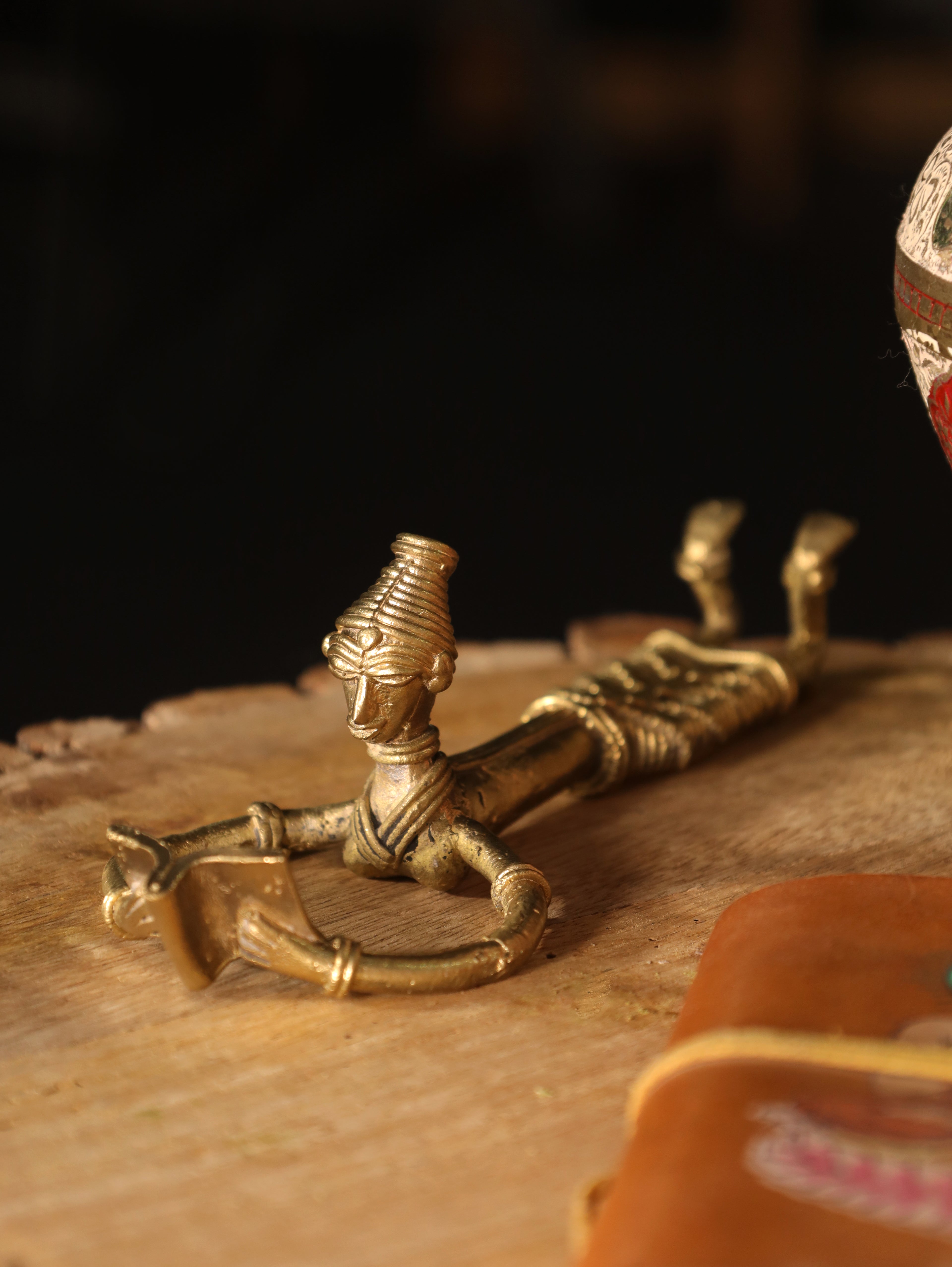 Dhokra Tribal Lady Reading in Sleeping Posture