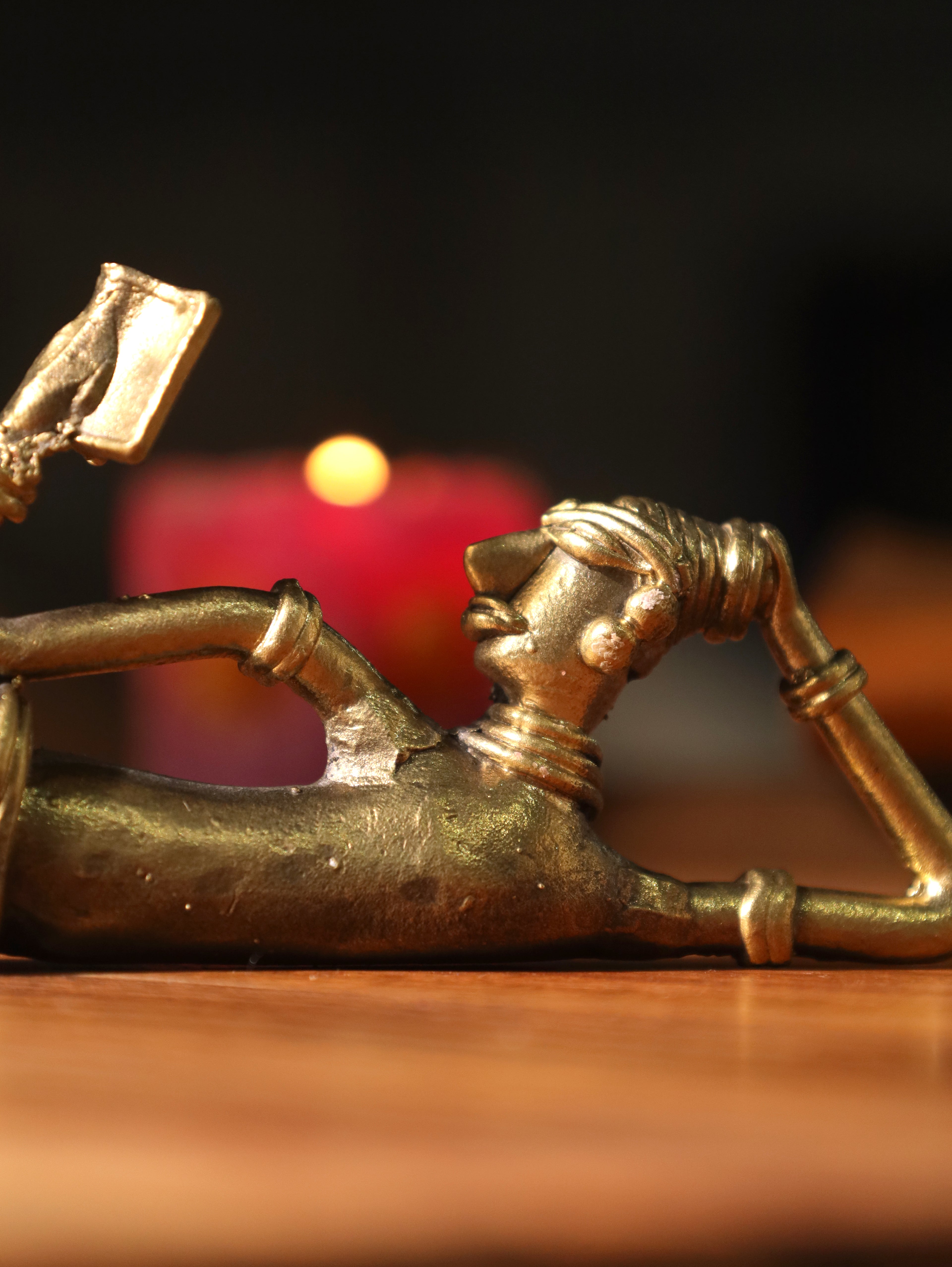 Dhokra Tribal Lady Reading Sideways