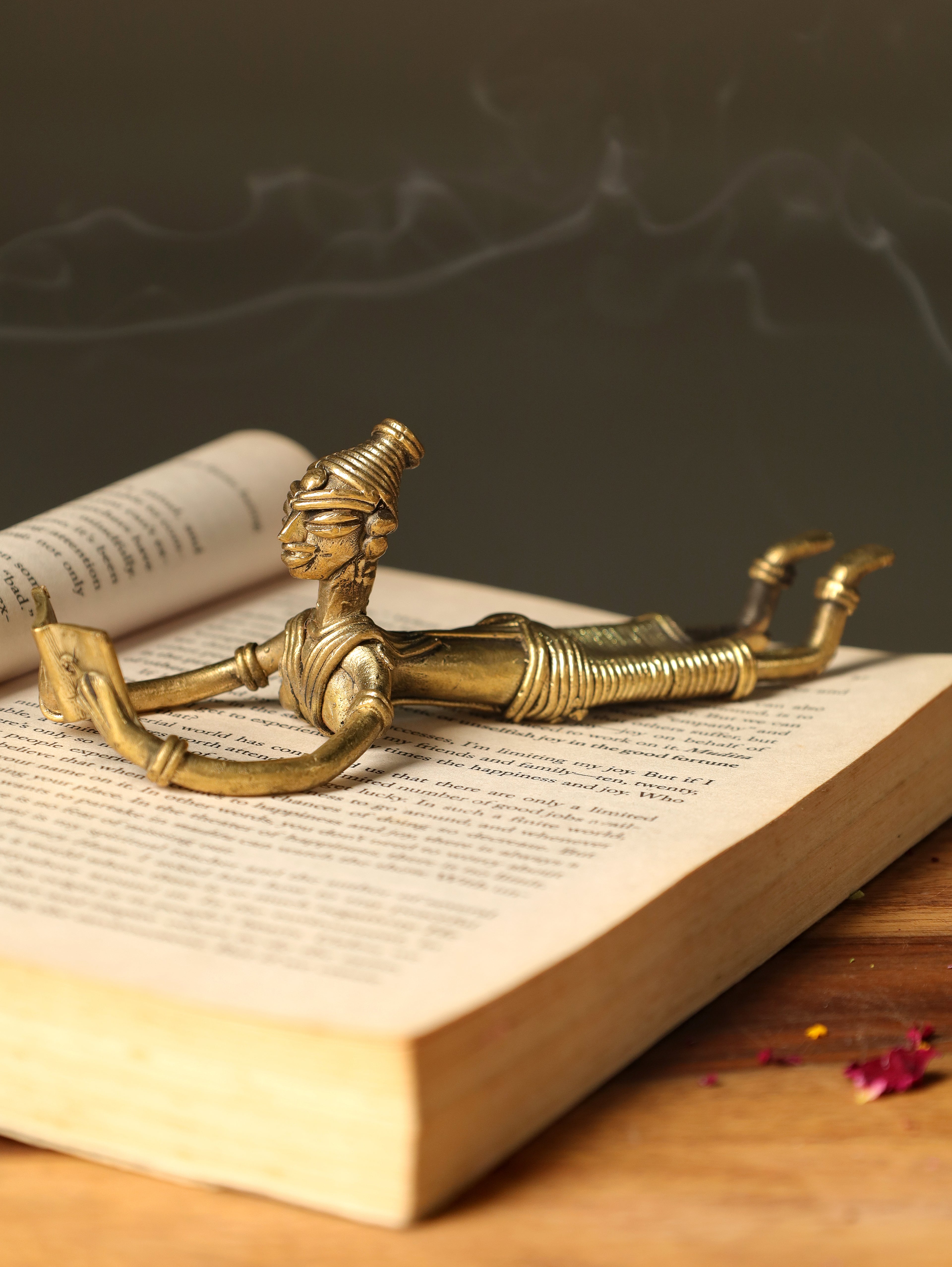 Dhokra Tribal Lady Reading in Sleeping Posture