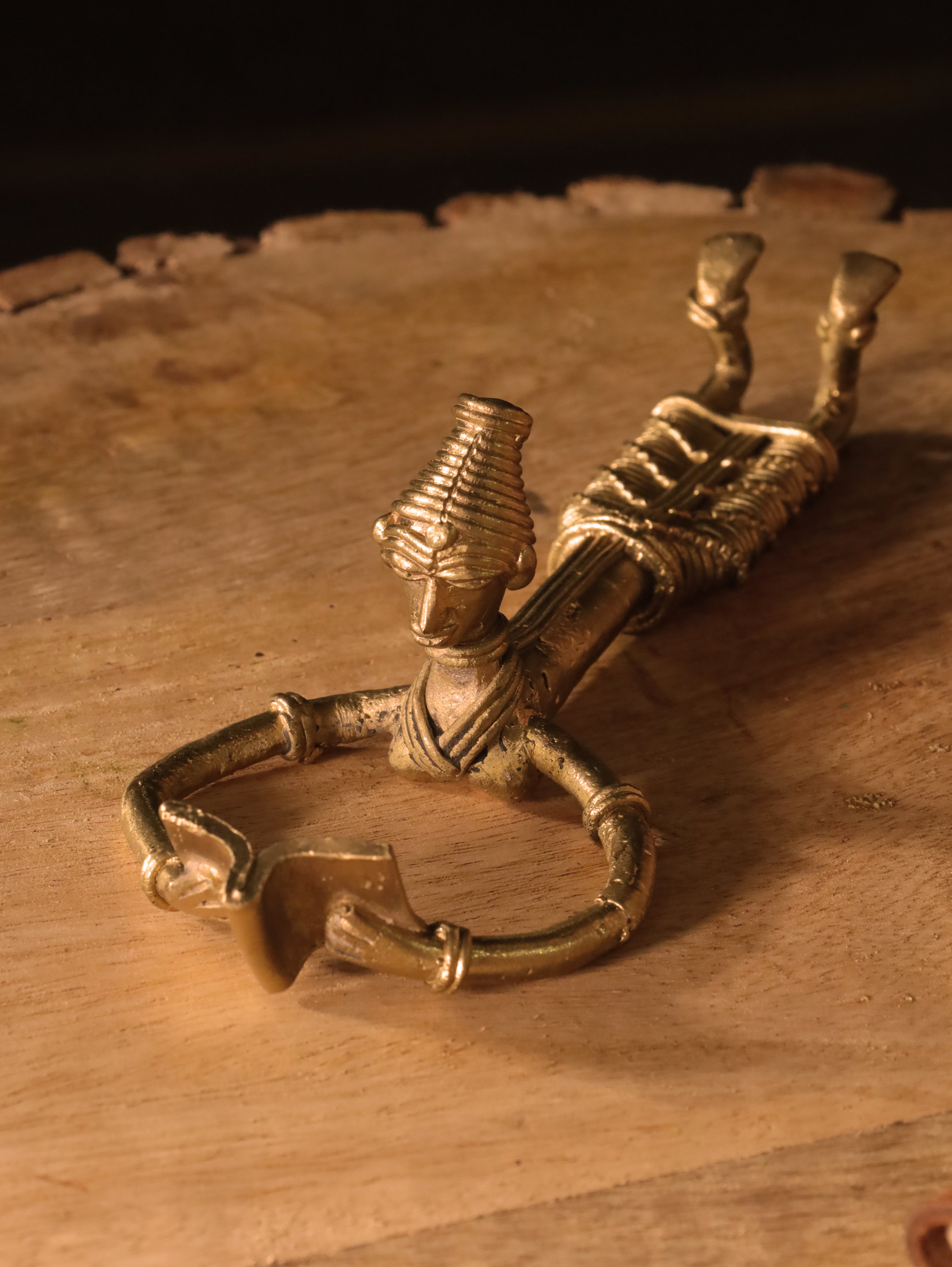 Dhokra Tribal Lady Reading in Sleeping Posture