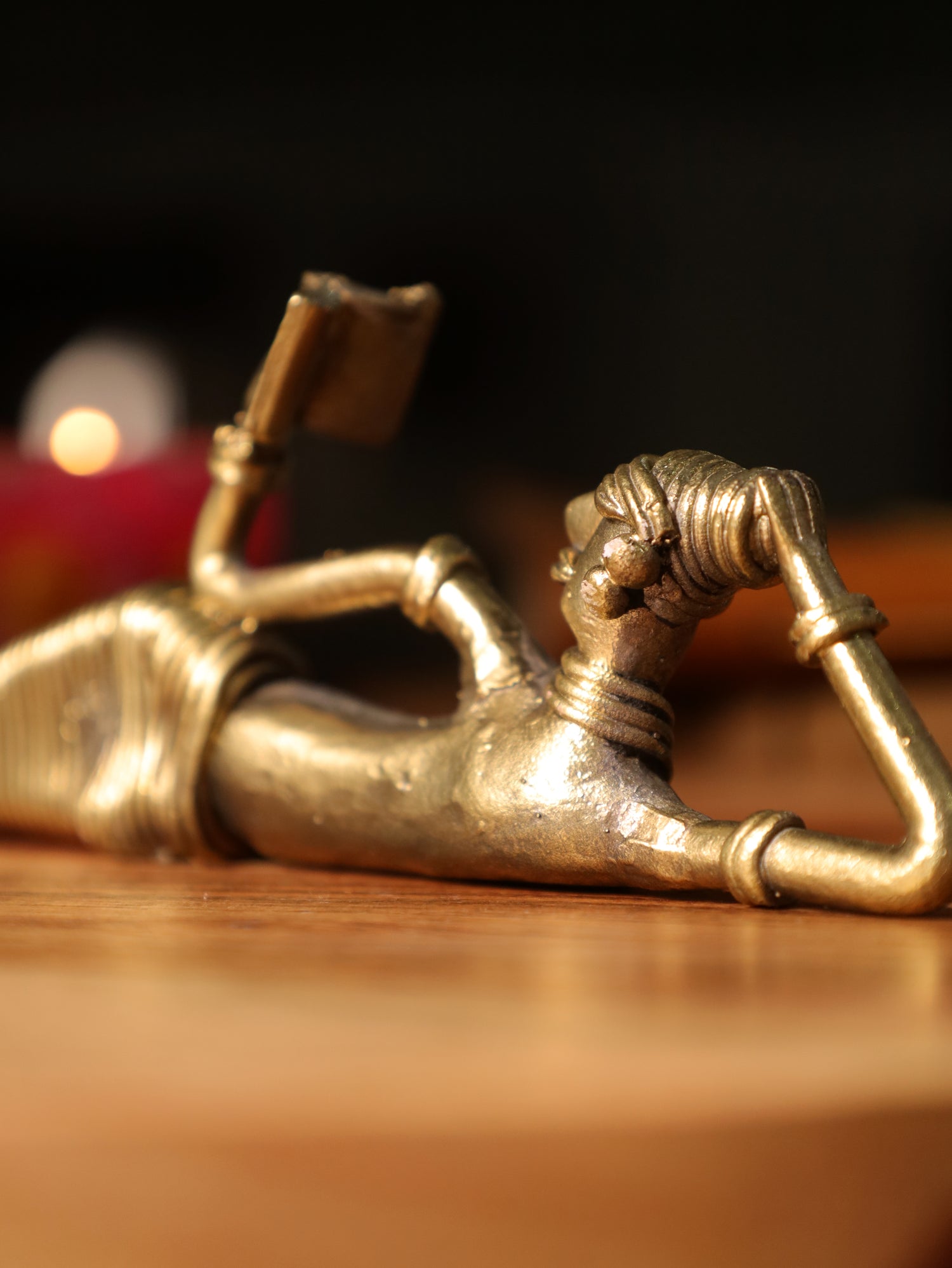 Dhokra Tribal Lady Reading Sideways