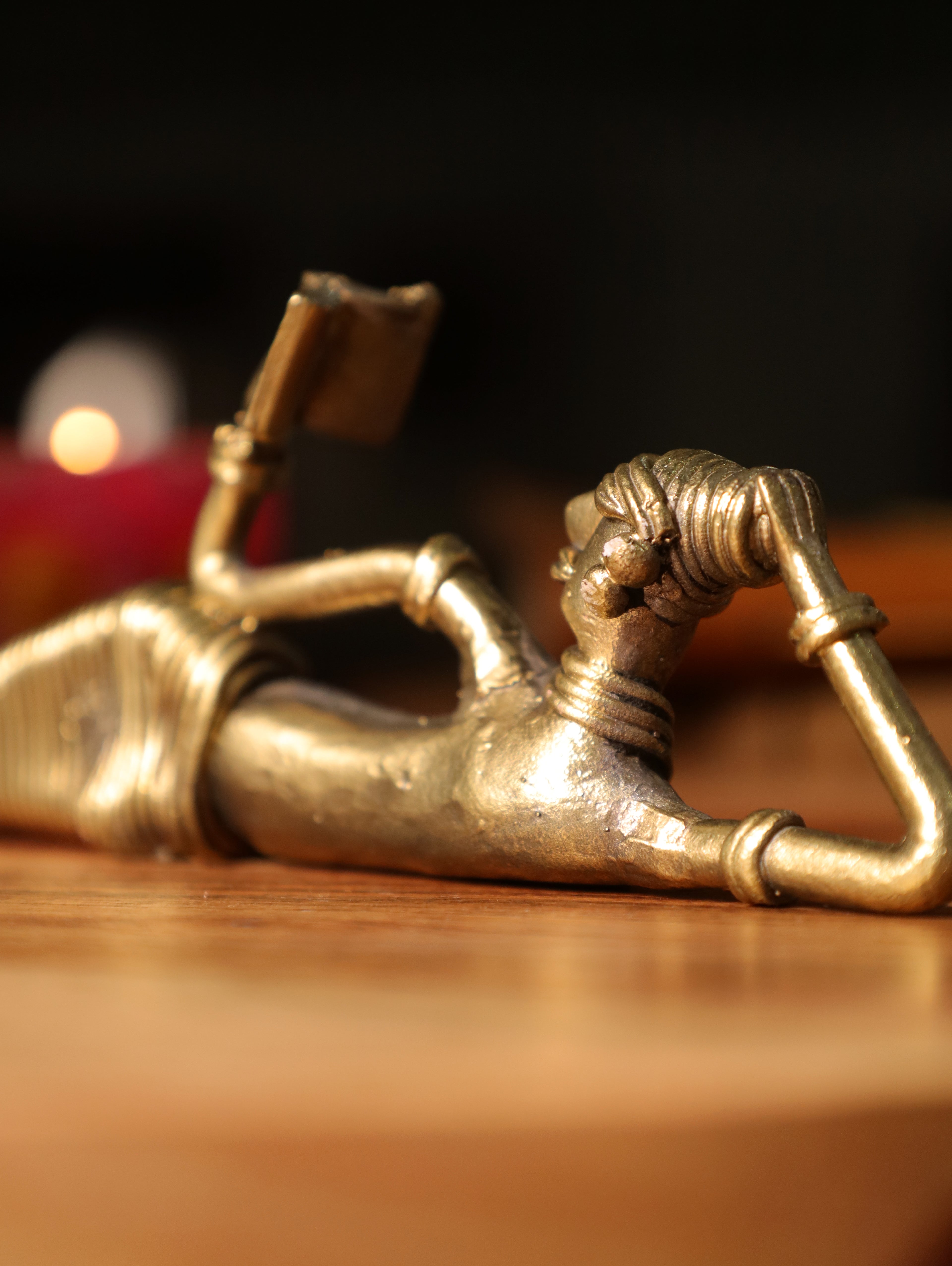 Dhokra Tribal Lady Reading Sideways
