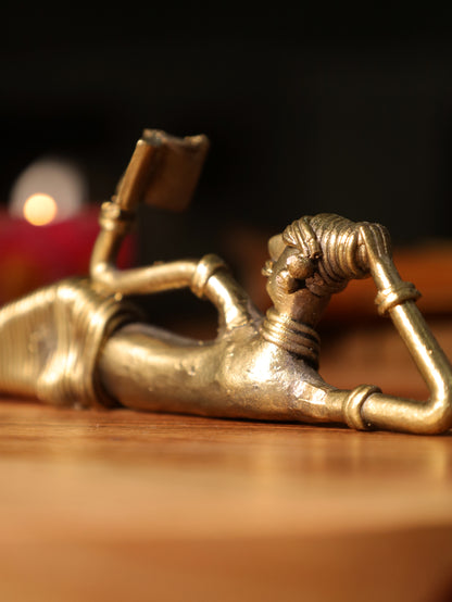 Dhokra Tribal Lady Reading Sideways