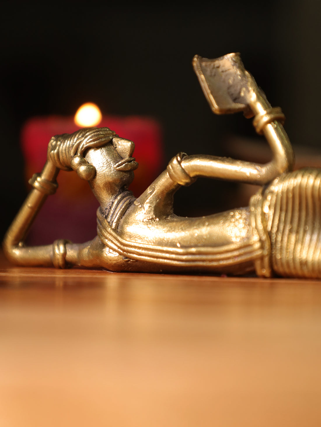 Dhokra Tribal Lady Reading Sideways