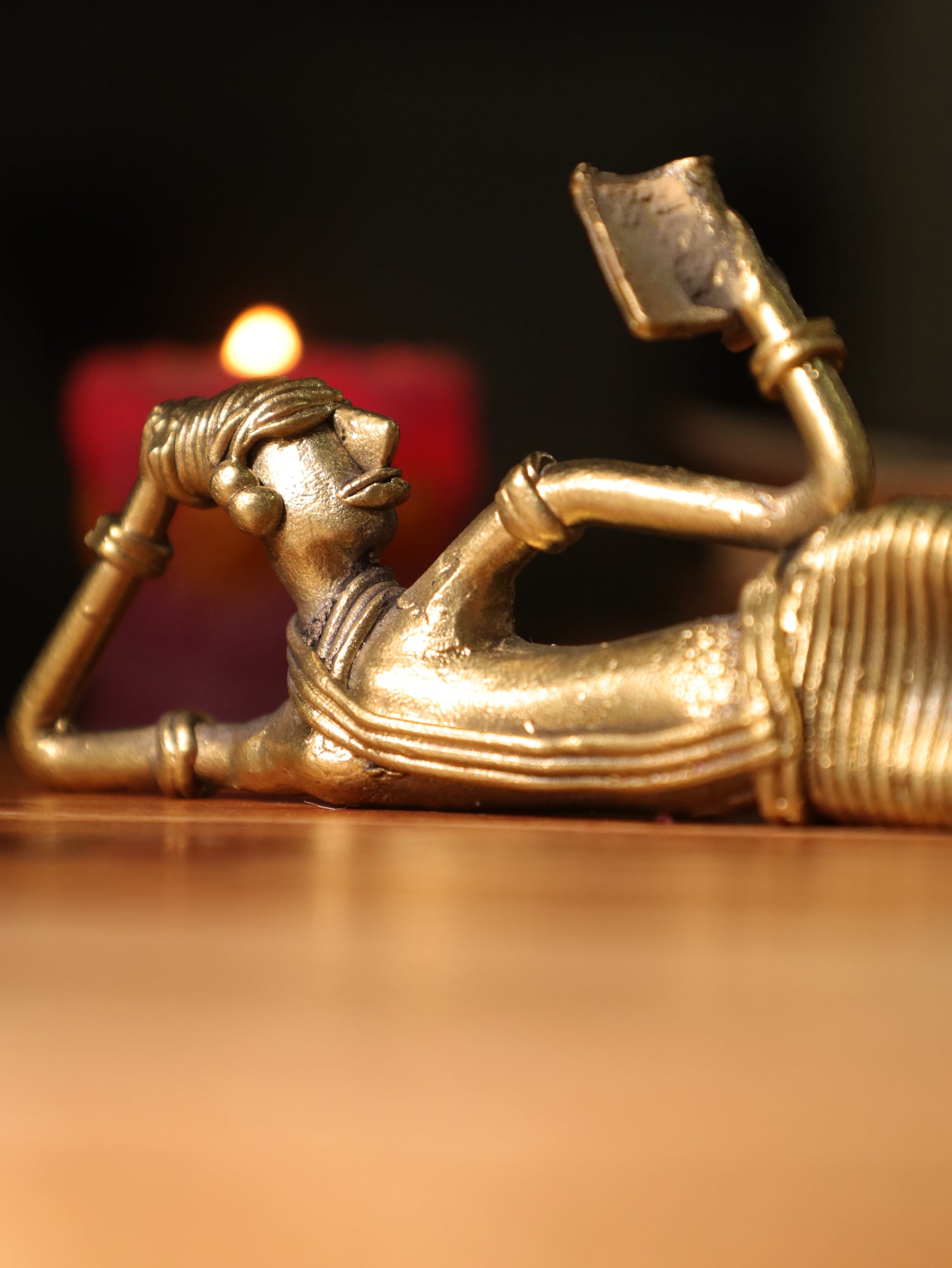 Dhokra Tribal Lady Reading Sideways