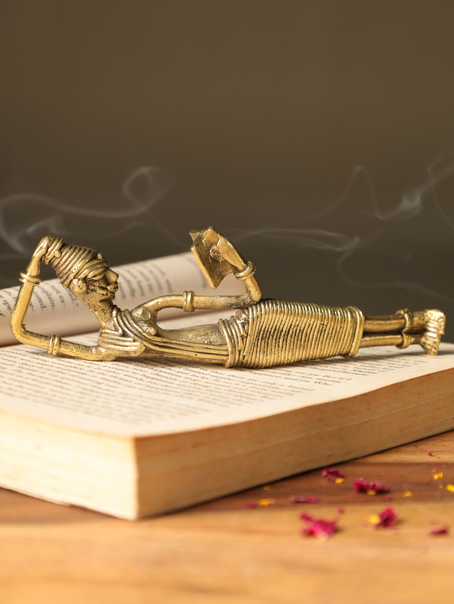 Dhokra Tribal Lady Reading Sideways