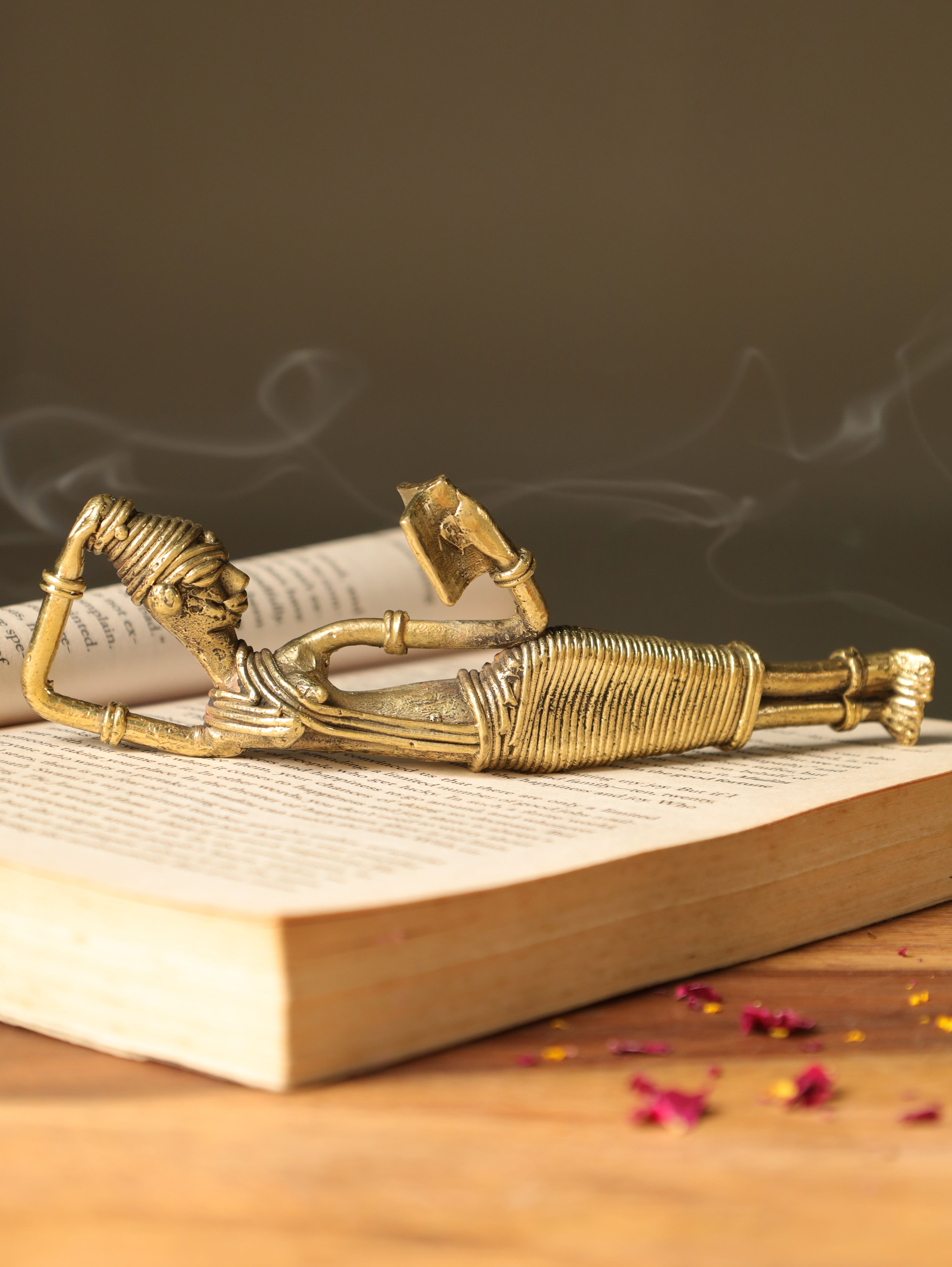 Dhokra Tribal Lady Reading Sideways