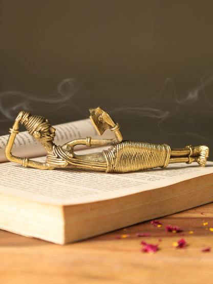 Dhokra Tribal Lady Reading Sideways